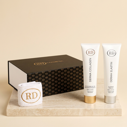 Coffret RD Cosmetic avec Derma Collagen et Derma Elastin 60 ml, bandeau RD et boîte cadeau sur un socle en pierre claire — Spa Santé Le Nénuphar