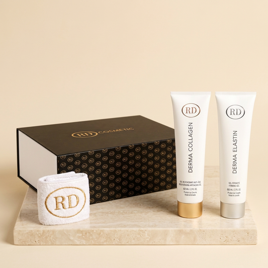 Coffret RD Cosmetic avec Derma Collagen et Derma Elastin 60 ml, bandeau RD et boîte cadeau sur un socle en pierre claire — Spa Santé Le Nénuphar