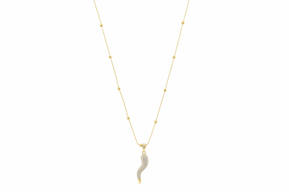 Collier Corno doré Caroline Néron — pendentif cornet porte-bonheur zirconium — Spa Santé Le Nénuphar