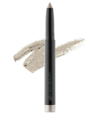 Cream Stay Shadow Stick Glo Skin Beauty, bâton ouvert avec une trace de couleur gris clair sur fond blanc, Spa Santé Le Nénuphar