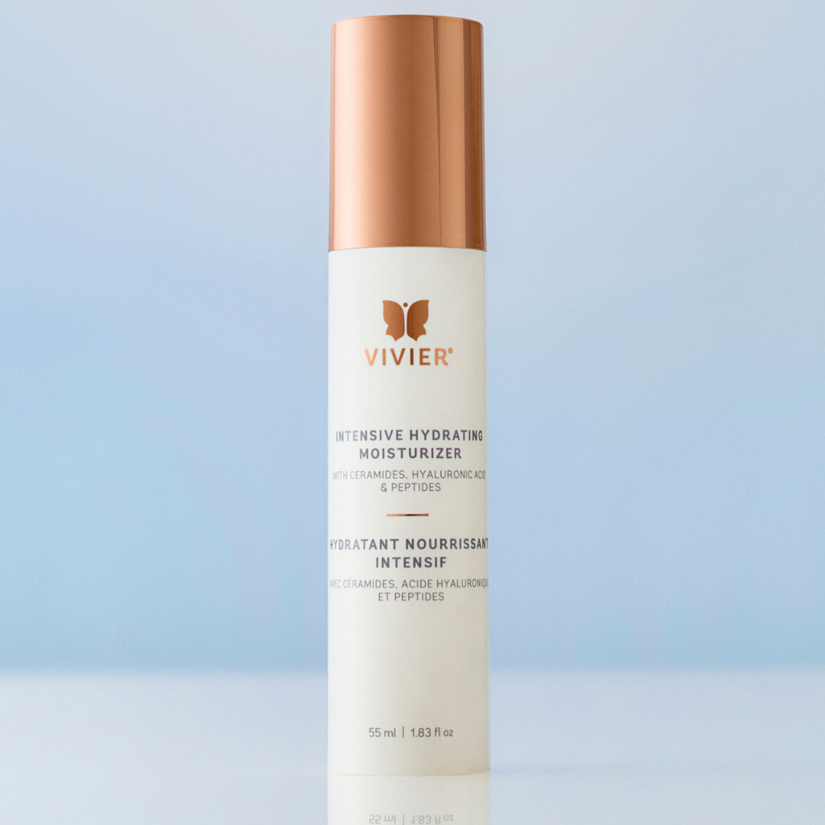Hydratant nourrissant intensif Vivier 55 ml, flacon-pompe blanc et or rosé sur fond bleu — Spa Santé Le Nénuphar