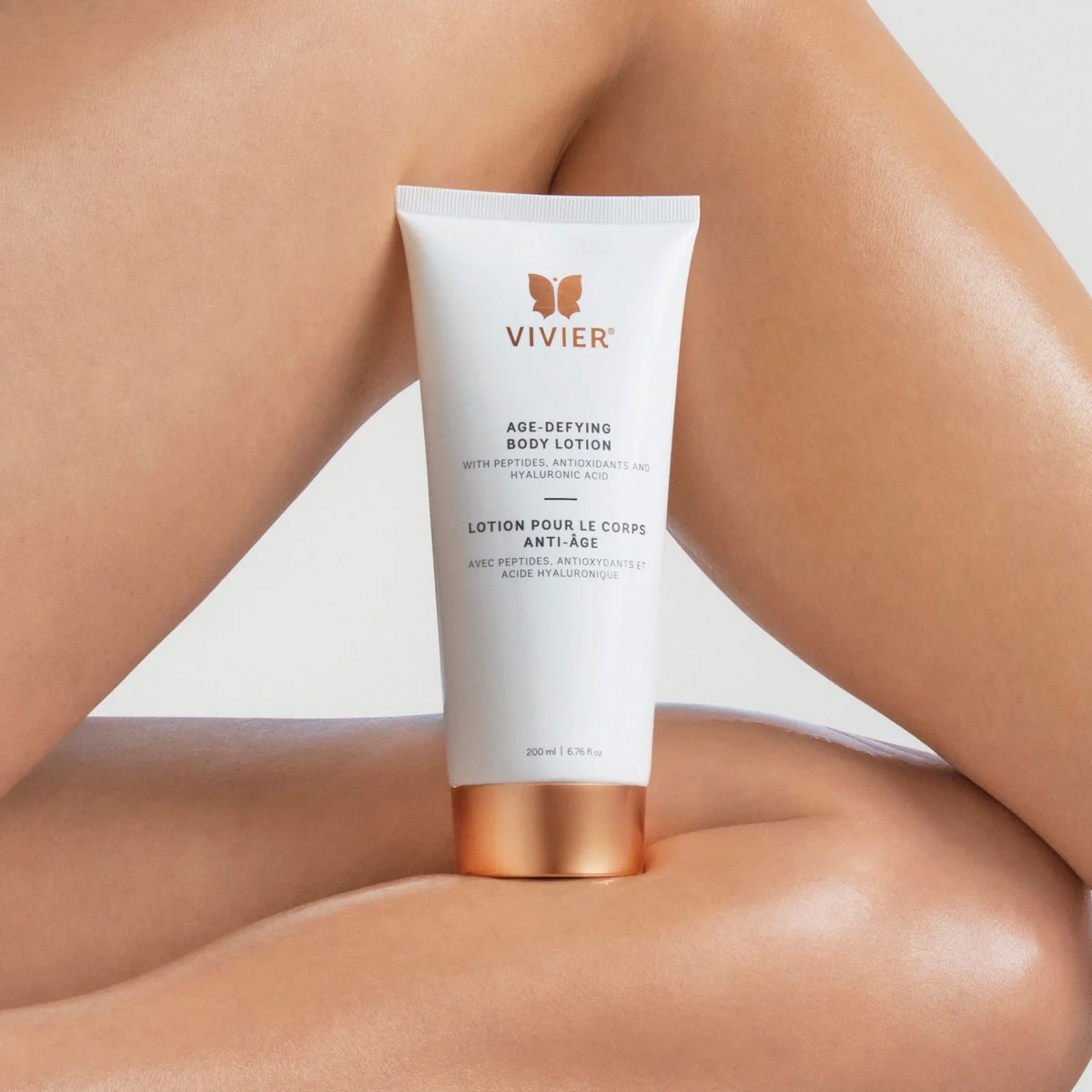 Lotion pour le corps anti-âge Vivier 200 ml — tube blanc et or rose avec peptides, antioxydants et acide hyaluronique