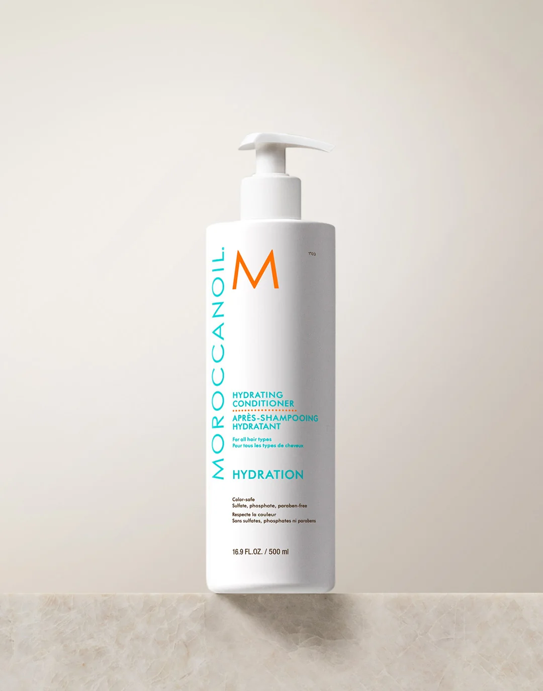Après-Shampooing Hydratant Moroccanoil 500 ml — flacon pompe blanc avec logo turquoise et orange