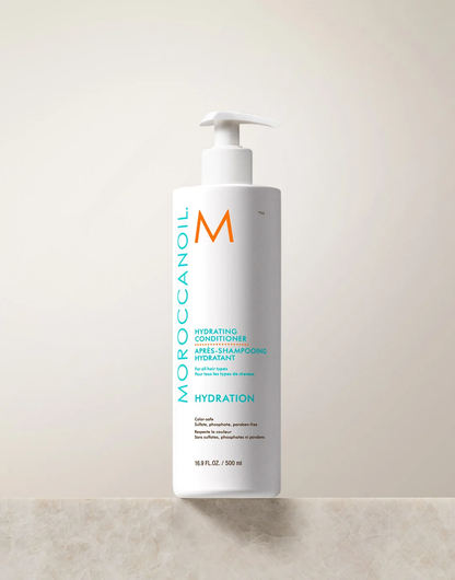 Après-Shampooing Hydratant Moroccanoil 500 ml — flacon pompe blanc avec logo turquoise et orange