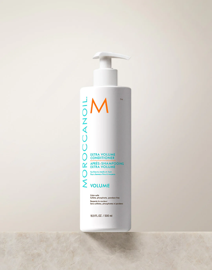 Après-Shampooing Extra Volume Moroccanoil 500 ml — flacon pompe blanc avec logo turquoise et orange
