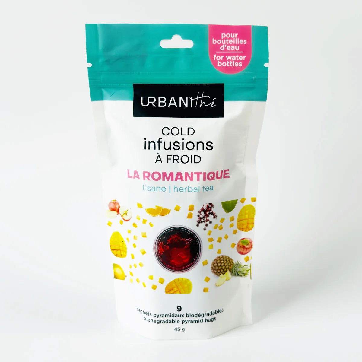 Vue de dessus d’un verre rempli de tisane La Romantique Urbanithé — liquide rouge vif intense, infusion à froid sans théine