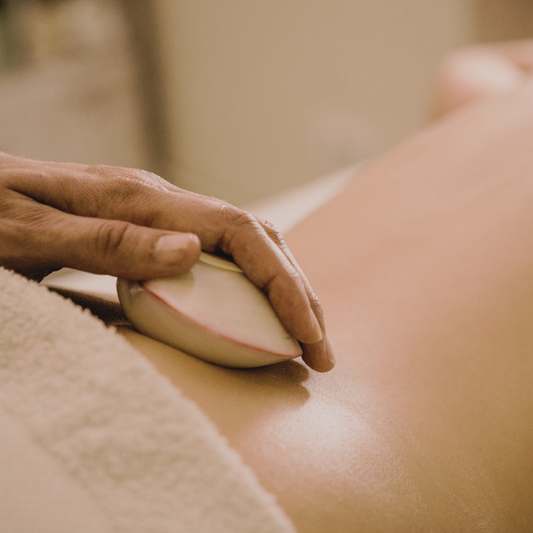 Massage aux coquillages chauds